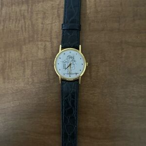 Elegant Black and Gold Watch